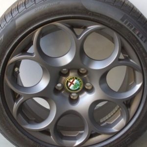 KIT CERCHI IN LEGA 433 A 7 FORI E PNEUMATICI PIRELLI P7 A/S ALFA ROMEO GIULIA 17 ORIGINALI